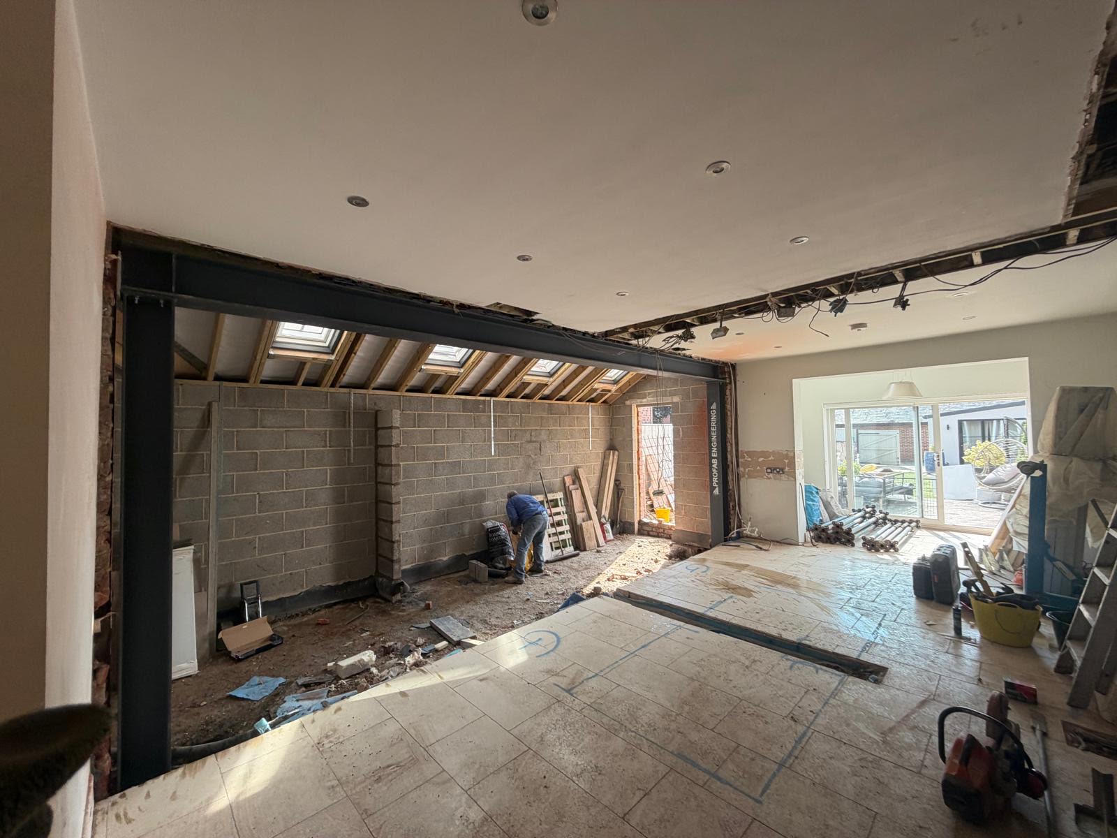 Steel beam opening formed between two rooms in Darlington