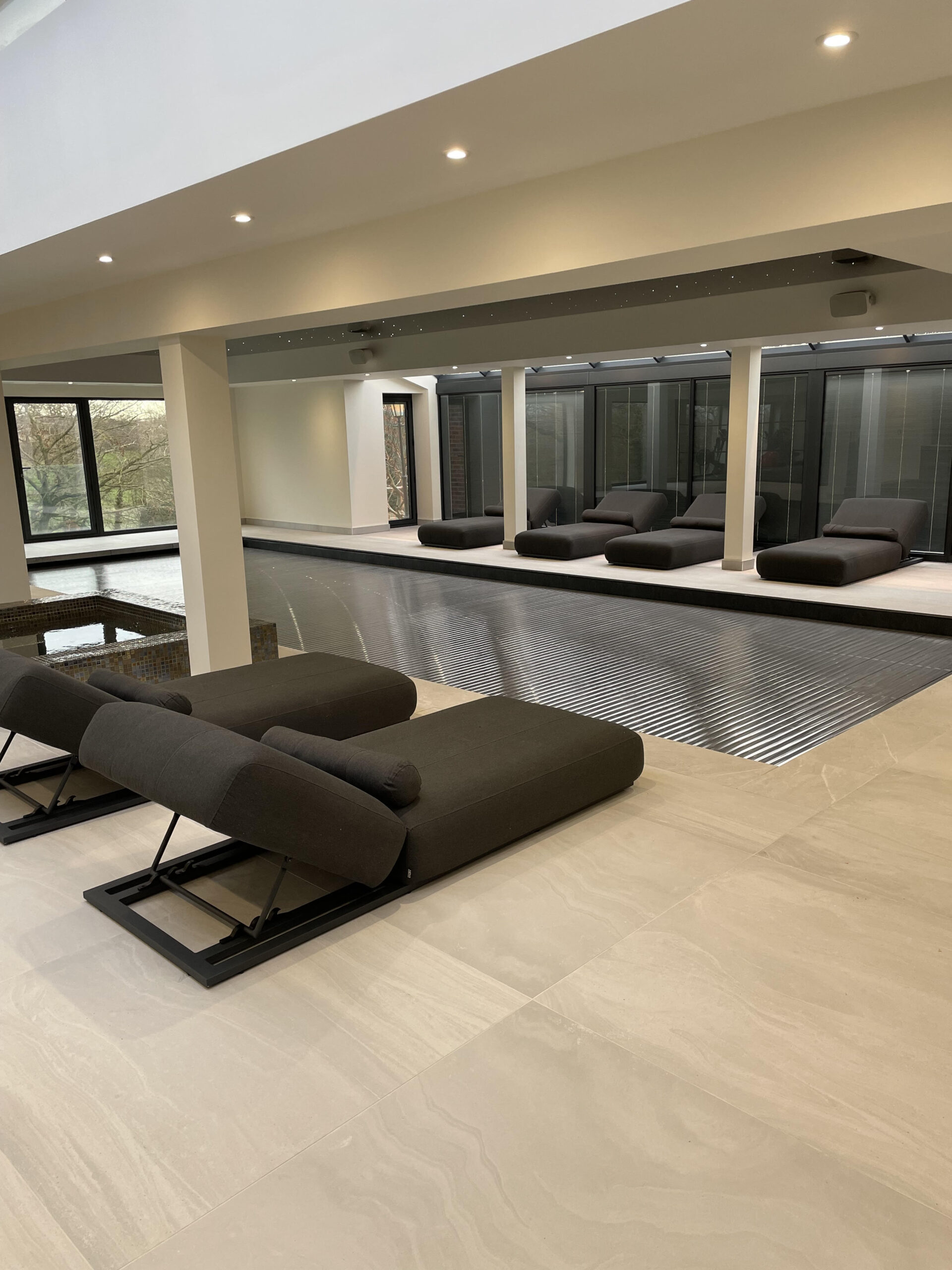 Completed indoor swimming pool with porcelain surround